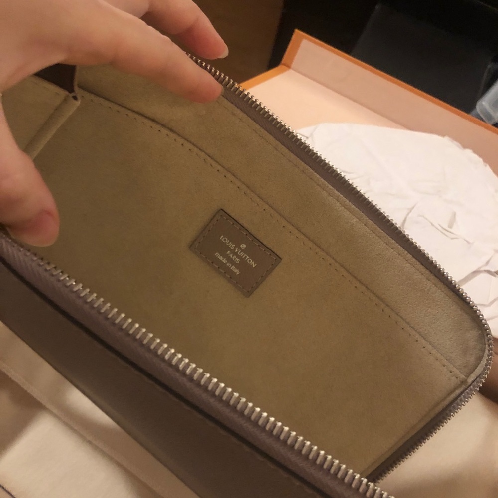 Authentic Louis Vuitton traveling wallet clutch